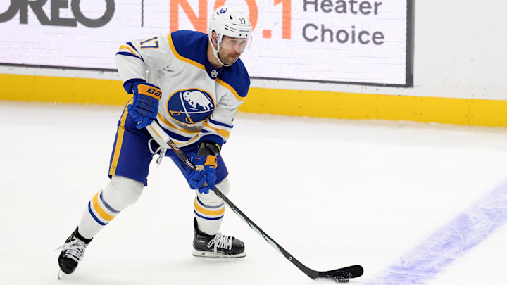 Nov 20, 2024; Los Angeles, California, USA;  Buffalo Sabres left wing Jason Zucker (17) controls the puck during the third period against the Los Angeles Kings at Crypto.com Arena. Mandatory Credit: Kiyoshi Mio-Imagn Images