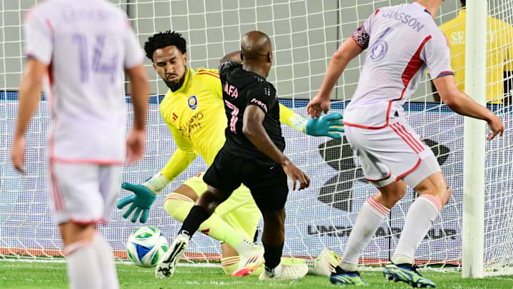 Fafa Picault, 7, prepares to kick a rebounded shot past Orlando City goalkeeper Pedro Gallese, giving Inter Miami a 2-2 draw in the team’s preseason friendly Friday in Tampa.