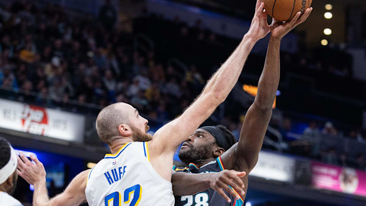 Nov 24, 2025; Indianapolis, Indiana, USA; Indiana Pacers center Jay Huff (32) blocks the shot of Detroit Pistons forward Isaiah Stewart (28) in the second half at Gainbridge Fieldhouse. Mandatory Credit: Trevor Ruszkowski-Imagn Images