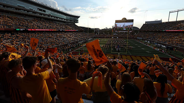Aug 28, 2025; Minneapolis, Minnesota, USA; Minnesota Golden Gophers fans wave towels before the game against the Buffalo Bulls at Huntington Bank Stadium. Mandatory Credit: Matt Krohn-Imagn Images Aug 28, 2025; Minneapolis, Minnesota, USA; Minnesota Golden Gophers fans wave towels before the game against the Buffalo Bulls at Huntington Bank Stadium. Mandatory Credit: Matt Krohn-Imagn Images