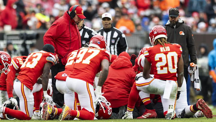 Dec 15, 2024; Cleveland, Ohio, USA; Kansas City Chiefs head coach Andy Reid watches over a player receiving medical treatment on the field during the second quarter against the Cleveland Browns at Huntington Bank Field. Mandatory Credit: Scott Galvin-Imagn Images