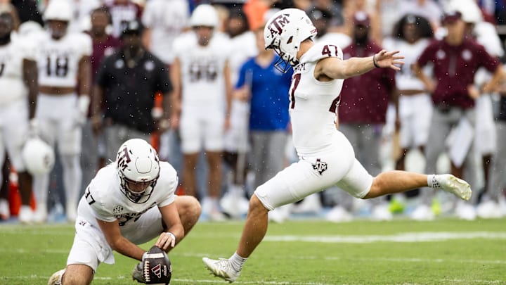 Texas A&M Aggies place kicker Randy Bond (47) kicks a field goal against the Florida Gators during the first half at Ben Hill Griffin Stadium.