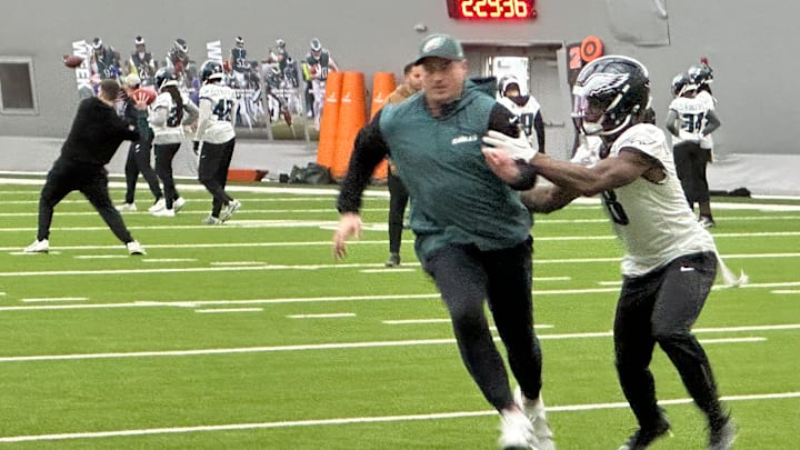 Former Eagles tight end Brent Celek runs a route on safety C.J. Gardner-Johnson during a practice in South Philly as the Eagles prepare for Super Bowl LIX.