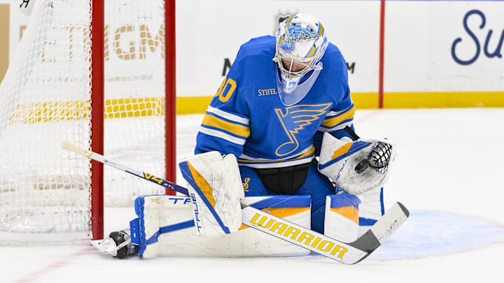 Jan 2, 2026; St. Louis, Missouri, USA; St. Louis Blues goaltender Joel Hofer (30) makes a save against the Vegas Golden Knights during the third period at Enterprise Center. Mandatory Credit: Jeff Curry-Imagn Images