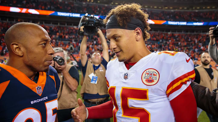 Oct 1, 2018; Denver, CO, USA; Kansas City Chiefs quarterback Patrick Mahomes (15) greets Denver Broncos cornerback Chris Harris Jr. (25) following the game at Broncos Stadium at Mile High. Mandatory Credit: Mark J. Rebilas-Imagn Images