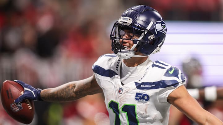 Dec 7, 2025; Atlanta, Georgia, USA; Seattle Seahawks wide receiver Jaxon Smith-Njigba (11) celebrates after a touchdown catch against the Atlanta Falcons in the fourth quarter at Mercedes-Benz Stadium.