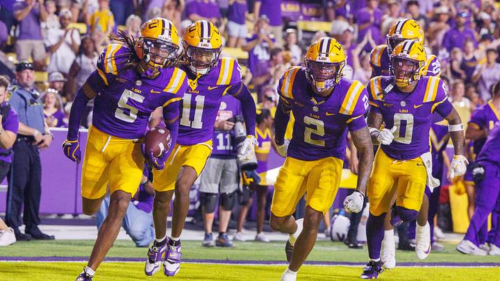Sep 12, 2026; Baton Rouge, Louisiana, USA;  LSU Tigers cornerback DJ Pickett (5) intercepts a pass against Louisiana Tech Bulldogs during the second half at Tiger Stadium.  Mandatory Credit: Stephen Lew-Imagn Images
