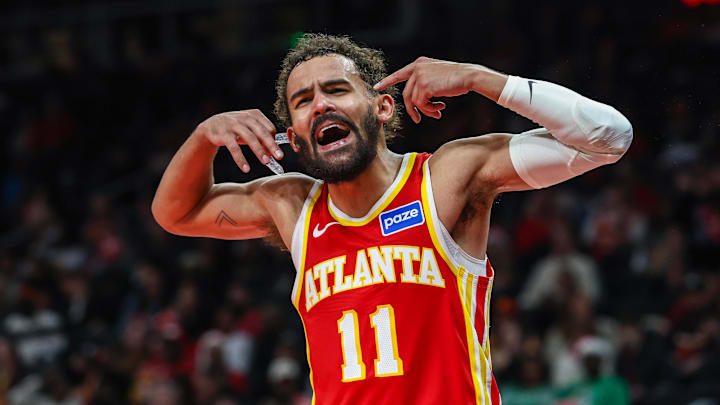 Dec 23, 2025; Atlanta, Georgia, USA; Atlanta Hawks guard Trae Young (11) yells at the referee during the game against the Chicago Bulls during the third quarter at State Farm Arena.