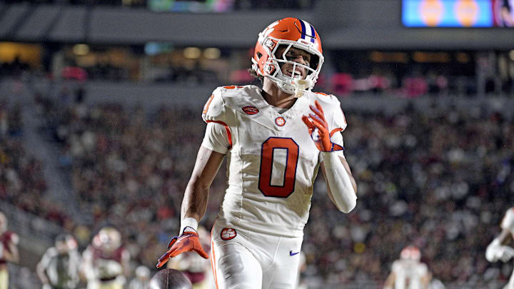 Oct 5, 2024; Tallahassee, Florida, USA; Clemson Tigers wide receiver Antonio Williams (0) scores a touchdown against the Florida State Seminoles during the first half at Doak S. Campbell Stadium. Mandatory Credit: Melina Myers-Imagn Images