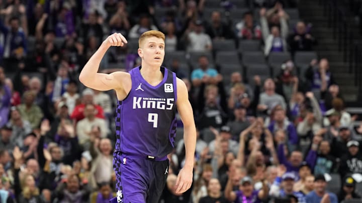 Dec 8, 2024; Sacramento, California, USA; Sacramento Kings guard Kevin Huerter (9) gestures after making a three point basket against the Utah Jazz during the fourth quarter at Golden 1 Center. Mandatory Credit: Darren Yamashita-Imagn Images