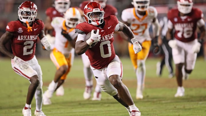 Arkansas Razorbacks running back Braylen Russell (0) rushes in the fourth quarter against the Tennessee Volunteers at Donald W. Reynolds Razorback Stadium. Arkansas won 19-14. Arkansas Razorbacks running back Braylen Russell (0) rushes in the fourth quarter against the Tennessee Volunteers at Donald W. Reynolds Razorback Stadium. Arkansas won 19-14.