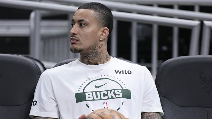 Apr 5, 2026; Milwaukee, Wisconsin, USA; Milwaukee Bucks forward Kyle Kuzma (18) waits to take the floor for pregame warmups before a game against Memphis Grizzlies at Fiserv Forum. Mandatory Credit: Michael McLoone-Imagn Images
