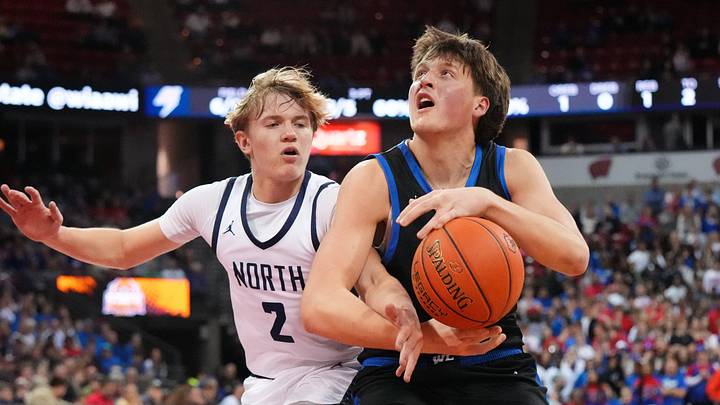 Wisconsin Lutheran's Kinston Knueppel (34) is fouled by Appleton North's Matthew Rosplochowski (2) during their WIAA Division 1 state semifinal basketball game on Friday, March 20, 2026, at the Kohl Center in Madison, Wisconsin. Wisconsin Lutheran's Kinston Knueppel (34) is fouled by Appleton North's Matthew Rosplochowski (2) during their WIAA Division 1 state semifinal basketball game on Friday, March 20, 2026, at the Kohl Center in Madison, Wisconsin.
