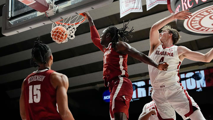 The University of Alabama unveiled the first banner honoring the school’s first Final Four appearance Friday, Oct. 11, 2024, in Coleman Coliseum. Alabama center Clifford Omoruyi (11) throws down a forceful dunk as he rips past Alabama forward Grant Nelson (4) during the scrimmage portion of the evening.