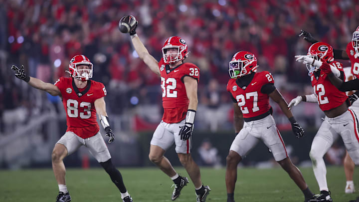 Nov 15, 2025; Athens, Georgia, USA; Georgia Bulldogs running back Cash Jones (32) and teammates celebrate during the second half against the Texas Longhorns at Sanford Stadium. Mandatory Credit: Brett Davis-Imagn Images
