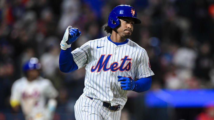 Apr 21, 2025; New York City, New York, USA; New York Mets shortstop Francisco Lindor (12) rounds the bases after hitting a three run home run against the Philadelphia Phillies during the seventh inning at Citi Field. Mandatory Credit: John Jones-Imagn Images