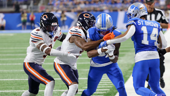 Bears safeties Jaquan Brisker and Kevin Byard route Jahmyr Gibbs out of bounds during the Week 2 loss at Detroit.