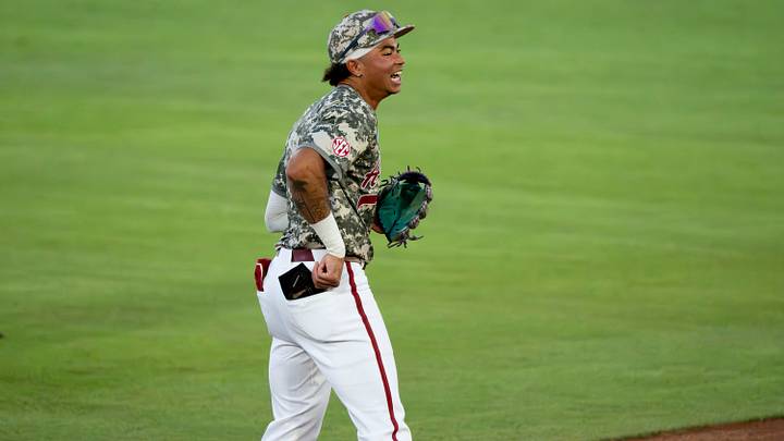 May 31, 2026; Tuscaloosa, AL, USA; Alabama shortstop Justin Lebron (1) is all smiles after a 3-6-4 double play during the Tuscaloosa NCAA Regional in the championship series between Oklahoma State and Alabama. May 31, 2026; Tuscaloosa, AL, USA; Alabama shortstop Justin Lebron (1) is all smiles after a 3-6-4 double play during the Tuscaloosa NCAA Regional in the championship series between Oklahoma State and Alabama.