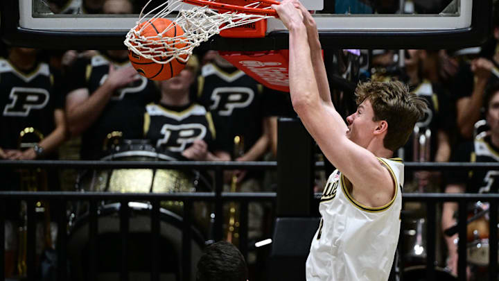 Purdue Boilermakers center Daniel Jacobsen (12) dunks the ball 