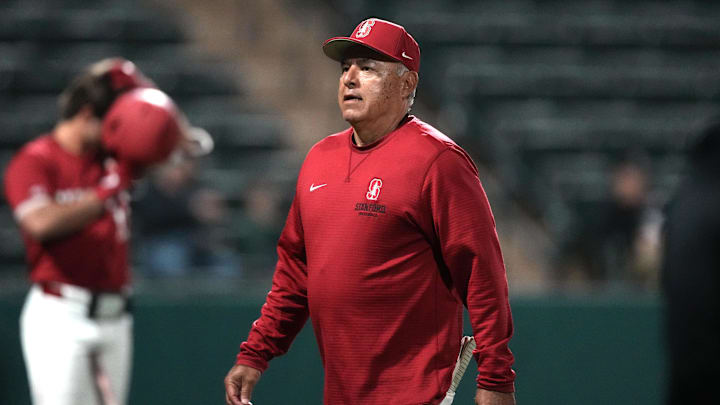 Mar 1, 2025; Stanford, CA, USA; Stanford Cardinal manager David Esquer walks to the dugout during the fifth inning against the Xavier Musketeers at Sunken Diamond. Mandatory Credit: Darren Yamashita-Imagn Images Mar 1, 2025; Stanford, CA, USA; Stanford Cardinal manager David Esquer walks to the dugout during the fifth inning against the Xavier Musketeers at Sunken Diamond. Mandatory Credit: Darren Yamashita-Imagn Images