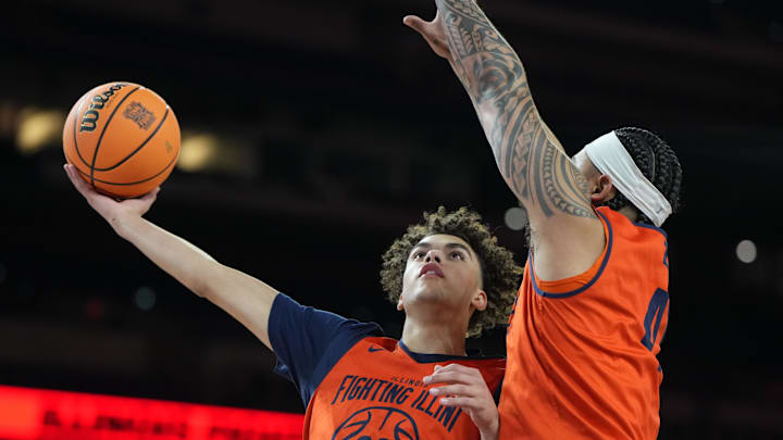 Apr 3, 2026; Indianapolis, IN, USA; Illinois Fighting Illini guard Keaton Wagler (23) shoots the ball against Illinois Fighting Illini guard Kylan Boswell (4) during a practice session ahead of the Final Four of the men's 2026 NCAA Tournament at Lucas Oil Stadium. Mandatory Credit: Bob Donnan-Imagn Images