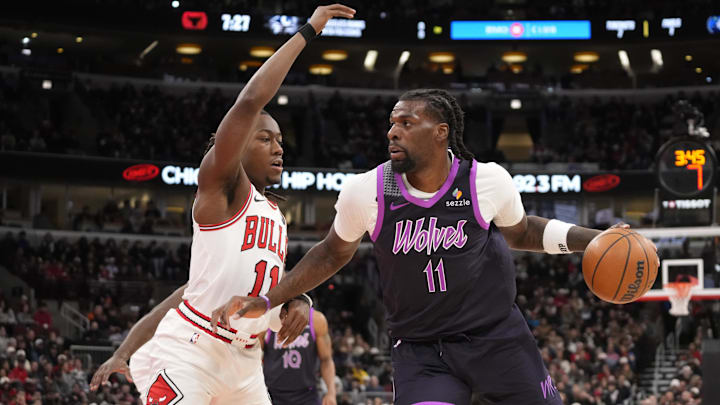 Dec 29, 2025; Chicago, Illinois, USA; Chicago Bulls guard Ayo Dosunmu (11) defends Minnesota Timberwolves center Naz Reid (11) during the first half at United Center. Mandatory Credit: David Banks-Imagn Images Dec 29, 2025; Chicago, Illinois, USA; Chicago Bulls guard Ayo Dosunmu (11) defends Minnesota Timberwolves center Naz Reid (11) during the first half at United Center. Mandatory Credit: David Banks-Imagn Images