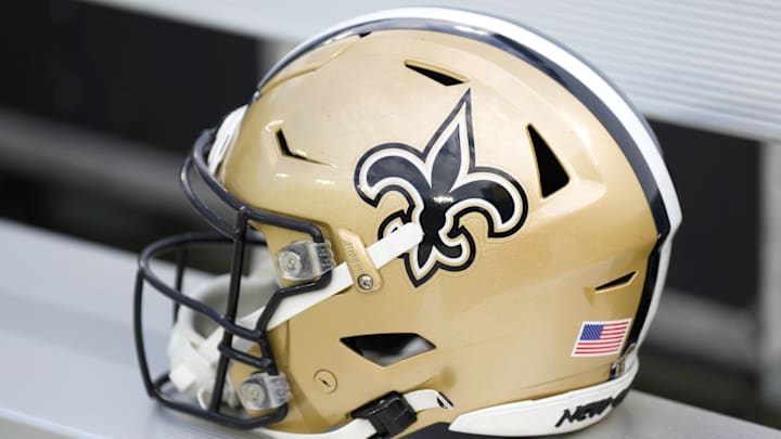Sep 24, 2023; Green Bay, Wisconsin, USA; An New Orleans Saints helmet during warmups prior to the game against the Green Bay Packers at Lambeau Field. Mandatory Credit: Jeff Hanisch-Imagn Images Sep 24, 2023; Green Bay, Wisconsin, USA; An New Orleans Saints helmet during warmups prior to the game against the Green Bay Packers at Lambeau Field. Mandatory Credit: Jeff Hanisch-Imagn Images