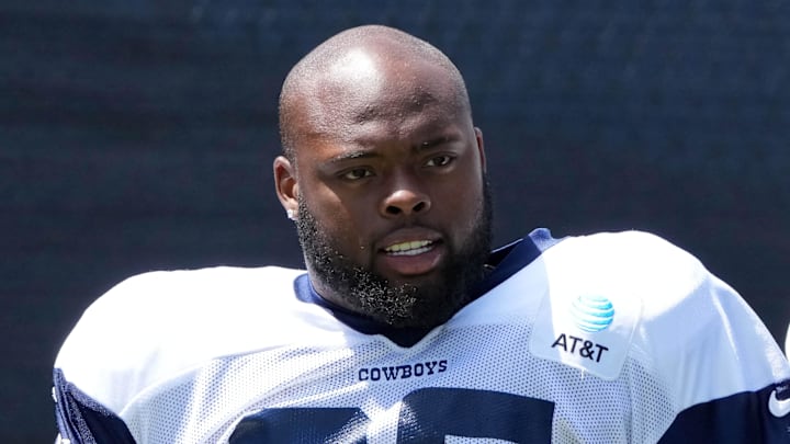 Dallas Cowboys guard Robert Jones (65) at training camp at the River Ridge Fields. Dallas Cowboys guard Robert Jones (65) at training camp at the River Ridge Fields.