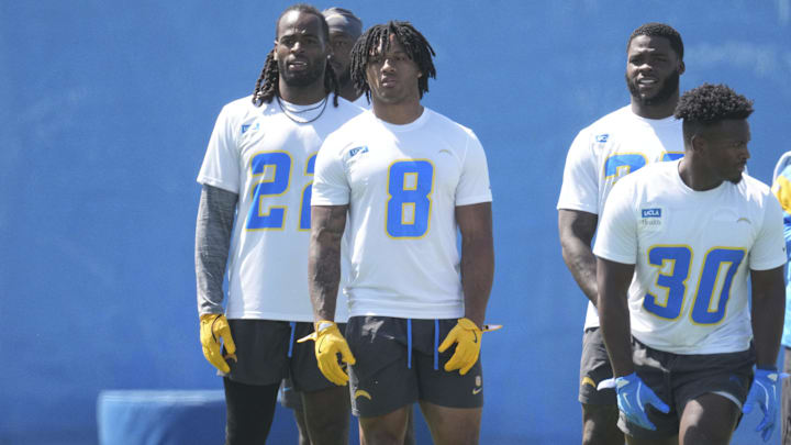 Los Angeles Chargers RBs Najee Harris, Omarion Hampton, and Kimani Vidal look on during offseason workouts at The Bolt.