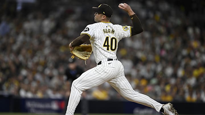 Oct 1, 2024; San Diego, California, USA; San Diego Padres pitcher Jason Adam (40) throws a pitch against the Atlanta Braves during the eighth inning in game one of the Wildcard round for the 2024 MLB Playoffs at Petco Park. Mandatory Credit: Denis Poroy-Imagn Images