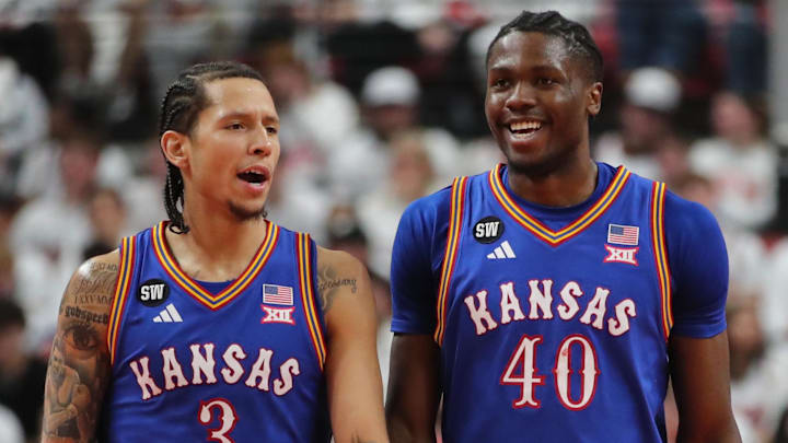 Kansas Jayhawks guard Tre White (3) and forward Flory Bidunga (40)  against the Texas Tech Red Raiders at United Supermarkets Arena. 