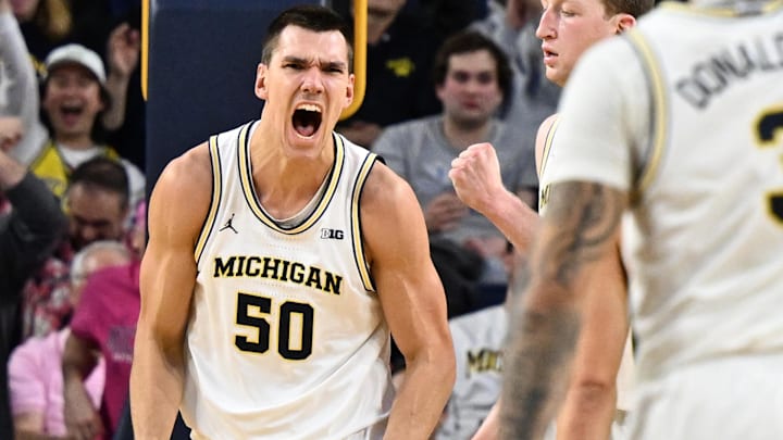 Feb 5, 2025; Ann Arbor, Michigan, USA;  Michigan Wolverines center Vladislav Goldin (50) reacts after scoring and drawing a foul against the Oregon Ducks in the second half at Crisler Center. Mandatory Credit: Lon Horwedel-Imagn Images