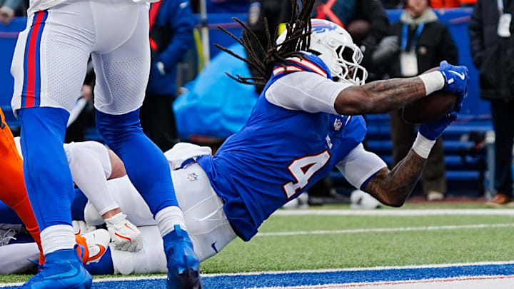 Buffalo Bills running back James Cook (4) scores a touchdown during the first half of the Buffalo Bills wild card game against the Denver Broncos at Highmark Stadium in Orchard Park on Jan. 12, 2025.