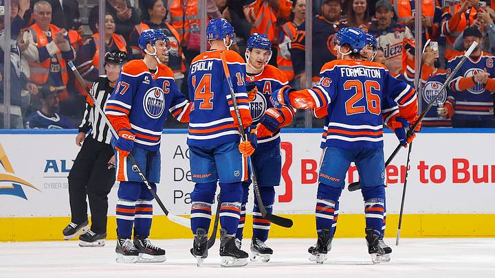 Sep 29, 2026; Edmonton, Alberta, CAN;  The Edmonton Oilers celebrate a goal scored by defensemen Evan Bouchard (2) during the second period against the Vancouver Canucks at Rogers Place.  Mandatory Credit: Perry Nelson-Imagn Images