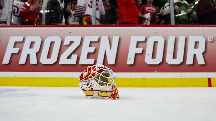 Apr 13, 2024; Saint Paul, Minnesota, USA; A detailed view of the helmet worn by Denver Pioneers goaltender Jack Caruso (31) after the game against the Boston College Eagles after the championship game of the 2024 Frozen Four college ice hockey tournament at Xcel Energy Center. Mandatory Credit: Matt Krohn-Imagn Images