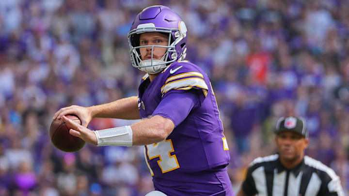 Sep 22, 2024; Minneapolis, Minnesota, USA; Minnesota Vikings quarterback Sam Darnold (14) throws a pass for a touchdown against the Houston Texans in the first quarter at U.S. Bank Stadium. Sep 22, 2024; Minneapolis, Minnesota, USA; Minnesota Vikings quarterback Sam Darnold (14) throws a pass for a touchdown against the Houston Texans in the first quarter at U.S. Bank Stadium.