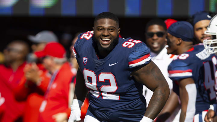 Nov 25, 2022; Tucson, Arizona, USA; Arizona Wildcats defensive lineman Kyon Barrs (92) against the Arizona State Sun Devils during the Territorial Cup at Arizona Stadium. Mandatory Credit: Mark J. Rebilas-Imagn Images
