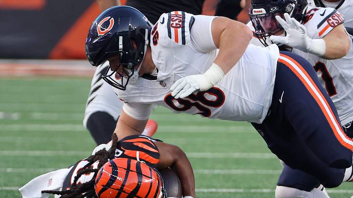 Chicago Bears defensive tackle Jordan van den Berg (96) makes a tackle