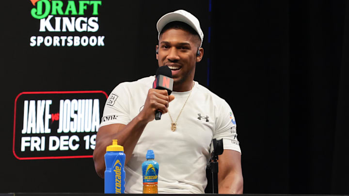 Nov 21, 2025; Miami, Florida, UNITED STATES; Anthony Joshua speaks to reporters during a press conference announcing his heavyweight boxing match against Jake Paul at Kaseya Center.