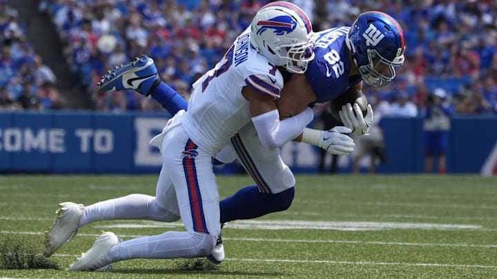 Buffalo Bills cornerback Taron Johnson tackles New York Giants tight end Daniel Bellinger.