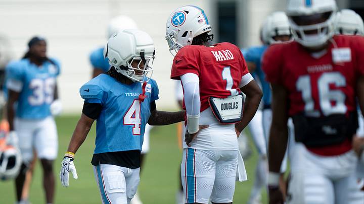 Tennessee Titans wide receiver Wan’Dale Robinson (4) and quarterback Cam Ward talk after individual drills during minicamp at Vanderbilt Health Football Center Tuesday, Aug. 4, 2026. Tennessee Titans wide receiver Wan’Dale Robinson (4) and quarterback Cam Ward talk after individual drills during minicamp at Vanderbilt Health Football Center Tuesday, Aug. 4, 2026.