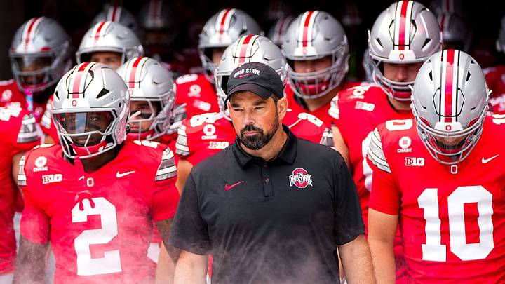 Ohio State Buckeyes head coach Ryan Day takes the field with his players before the NCAA football game against the Ball State Cardinals at Ohio Stadium on Sept. 5, 2026 in Columbus, Ohio. Ohio State Buckeyes head coach Ryan Day takes the field with his players before the NCAA football game against the Ball State Cardinals at Ohio Stadium on Sept. 5, 2026 in Columbus, Ohio.