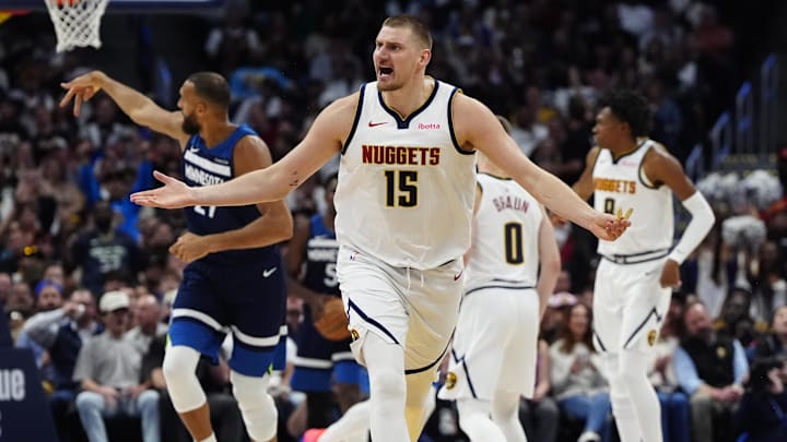 Mar 12, 2025; Denver, Colorado, USA; Denver Nuggets center Nikola Jokic (15) reacts in the second quarter against the Minnesota Timberwolves at Ball Arena. Mandatory Credit: Ron Chenoy-Imagn Images