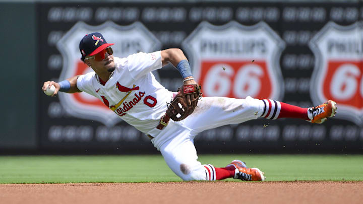 Aug 17, 2025; St. Louis, Missouri, USA;  St. Louis Cardinals shortstop Masyn Winn (0) throws from his knees to force out New York Yankees center fielder Trent Grisham (not pictured) during the first inning at Busch Stadium. Mandatory Credit: Jeff Curry-Imagn Images