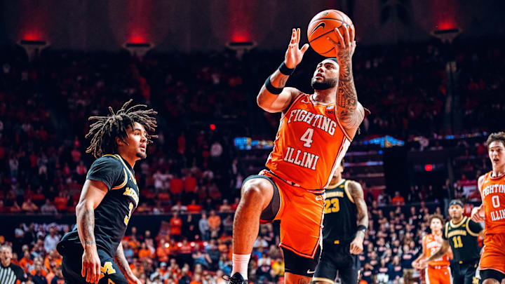 Illinois guard Kylan Boswell (4) floats to the rim against Michigan in the Illini's 84-70 loss to Michigan last Friday at the State Farm Center in Champaign, Illinois. Illinois guard Kylan Boswell (4) floats to the rim against Michigan in the Illini's 84-70 loss to Michigan last Friday at the State Farm Center in Champaign, Illinois.