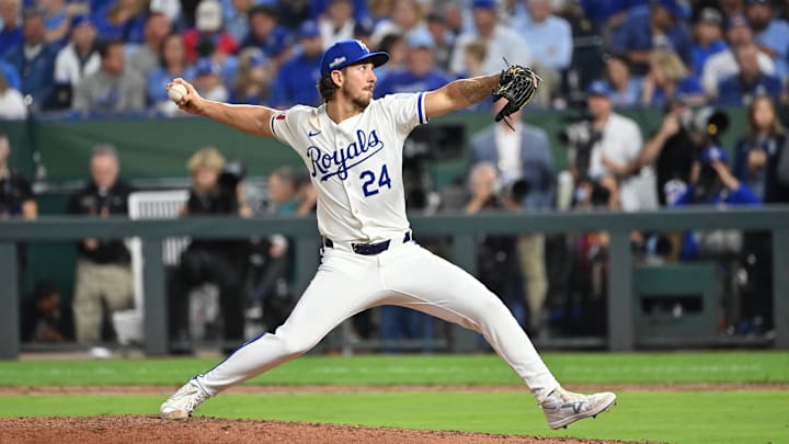 Kansas City Royals pitcher Michael Lorenzen (24) pitches in the ninth inning against the New York Yankees during game three of the NLDS for the 2024 MLB Playoffs at Kauffman Stadium. 