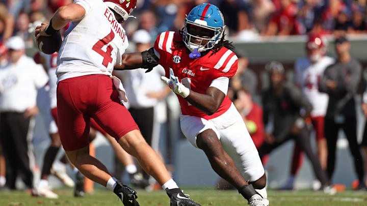 Oct 11, 2025; Oxford, Mississippi, USA; Mississippi Rebels linebacker Princewill Umanmielen (1) sacks Washington State Cougars quarterback Zevi Eckhaus (4) during the fourth quarter at Vaught-Hemingway Stadium. Mandatory Credit: Petre Thomas-Imagn Images