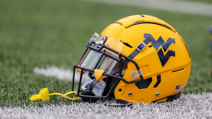 Sep 14, 2019; Morgantown, WV, USA; A West Virginia Mountaineers helmet on the field during warmups at Mountaineer Field at Milan Puskar Stadium. Mandatory Credit: Ben Queen-Imagn Images