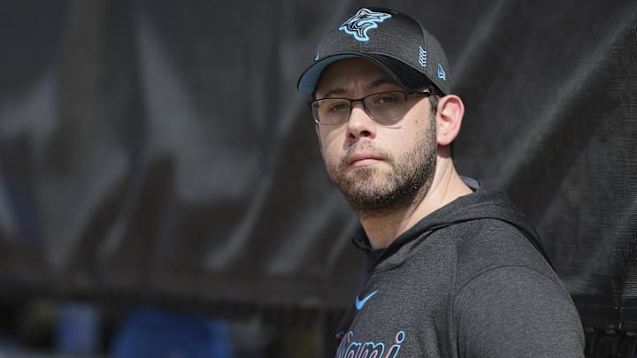 Feb 17, 2024; Jupiter, FL, USA; Miami Marlins president of baseball operations Peter Bendix watches during a spring training workout at the Marlins Player Development & Scouting Complex. Mandatory Credit: Sam Navarro-Imagn Images