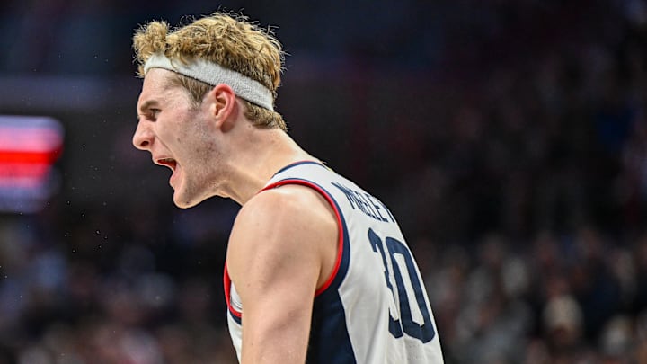 Nov 19, 2024; Storrs, Connecticut, USA; Connecticut Huskies forward Liam McNeeley (30) celebrates during the first half against Texas A&M Commerce at Harry A. Gampel Pavilion. Mandatory Credit: Mark Smith-Imagn Images
